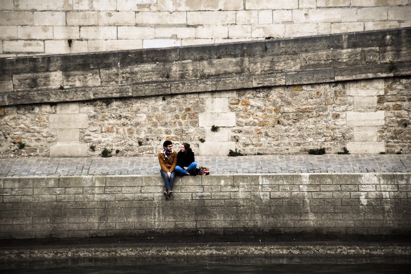 couple on river bank